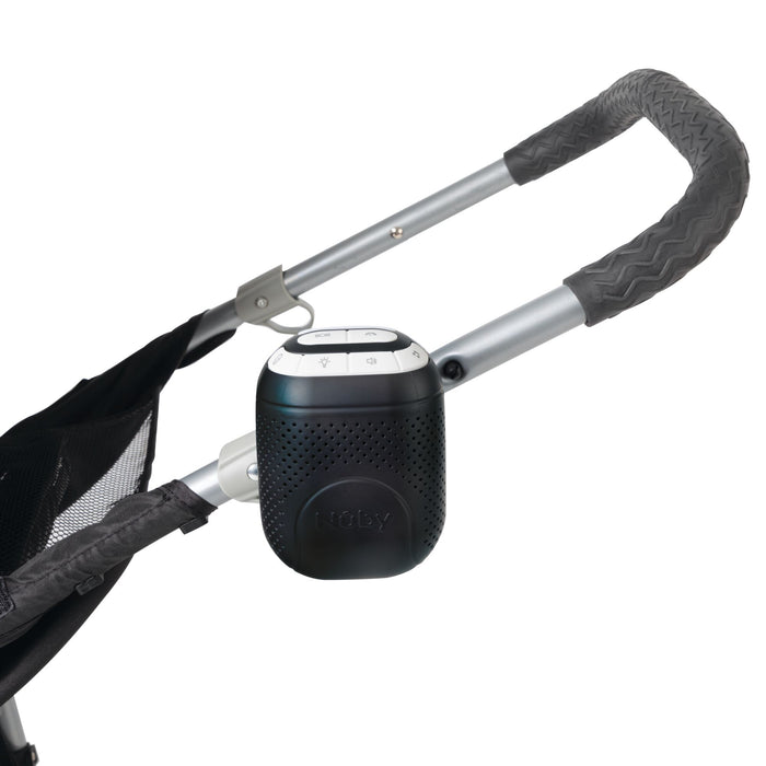 The Nuby Stroller Rocker portable Bluetooth speaker clips onto your stroller handlebar, with easy top buttons and a perforated grille—ideal for soothing sounds or pairing with your favorite Stroller Rocker.