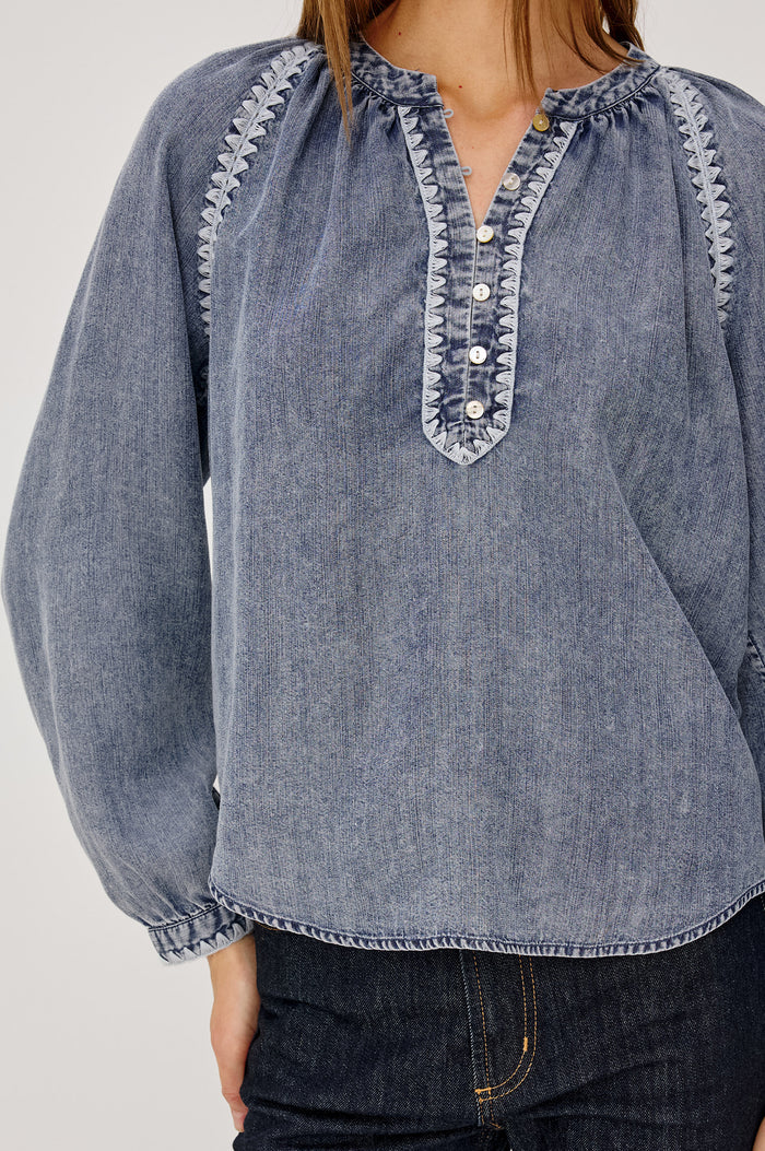 Tali Shirt in TENCEL™ Denim With Boxy Loose Fit, Blanket Stitch Trim, Raglan Sleeves, and Half Placket in Blue Ridge Colorway - Upper Body Front View Featured on Model