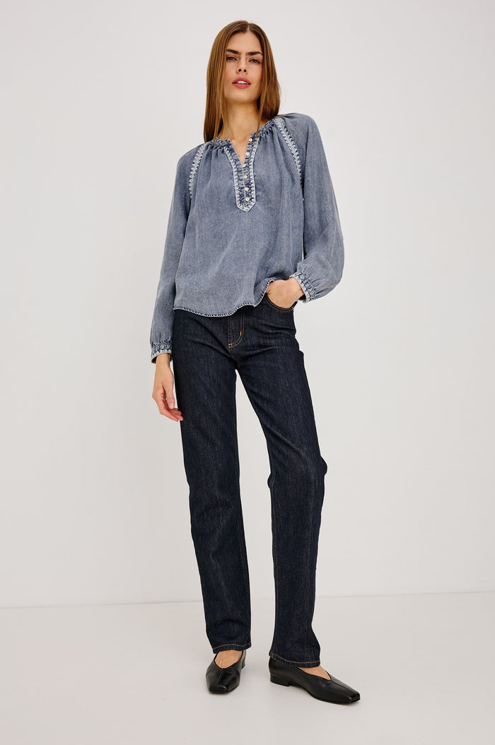 Tali Shirt in TENCEL™ Denim With Boxy Loose Fit, Blanket Stitch Trim, Raglan Sleeves, and Half Placket in Blue Ridge Colorway - Full Body Front View Featured on Model