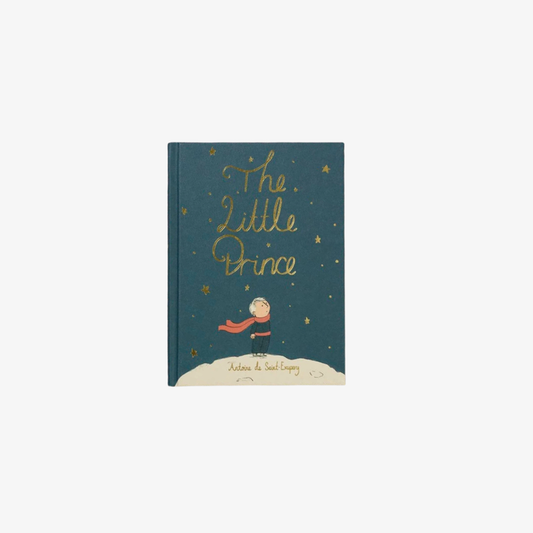 Book titled 'The Little Prince' with a cover illustration on a white background
