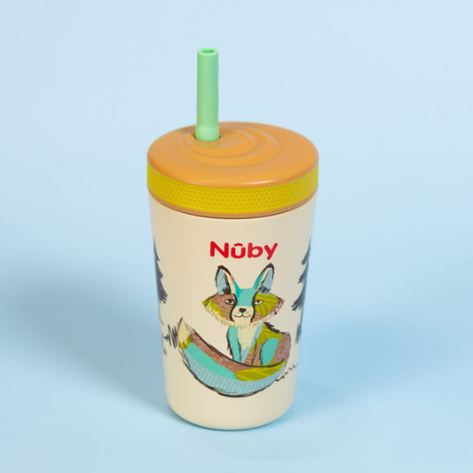 A cream-colored Nuby Thirsty Kids Flexstraw Stainless Steel Cup | Fox with an orange lid, green straw, and a colorful fox illustration on the side, shown against a light blue background.
