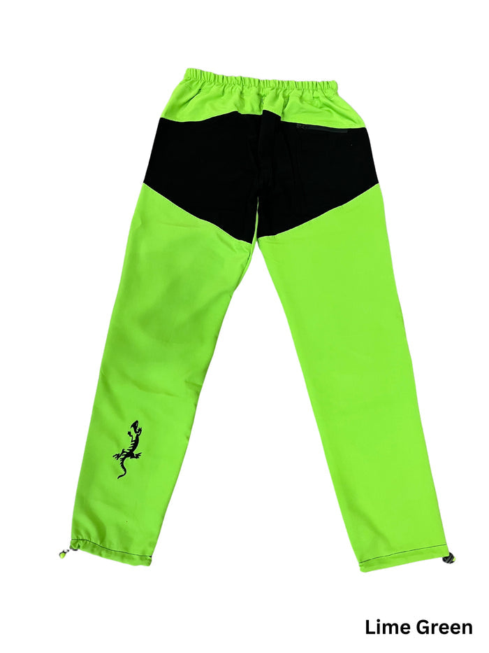 Lime Green TURK MOUNTAIN men's climbing pants with black reinforced knees, elastic waistband, and gecko logo.