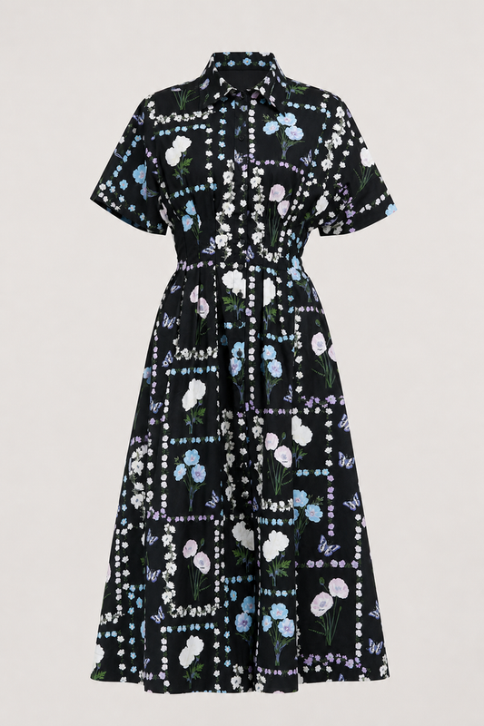 front view of Wilderra Trevis Floral black pleated midi shirt dress with collar and short sleeves