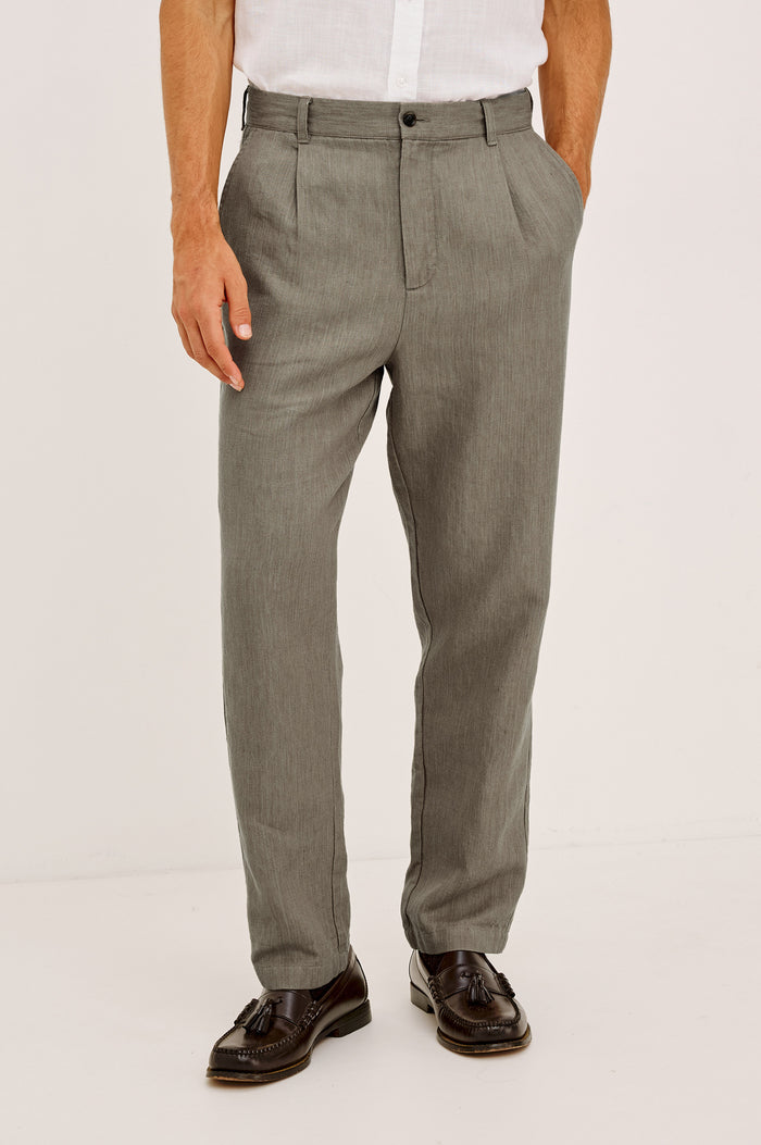Zimmer Pant in Cotton Linen Wool Blend With Relaxed Fit, Tapered Leg, Side Pockets, Zip Fly, Belt Loops, and Back Welt Pockets in Walnut Colorway - Lower Body Front View Featured on Model