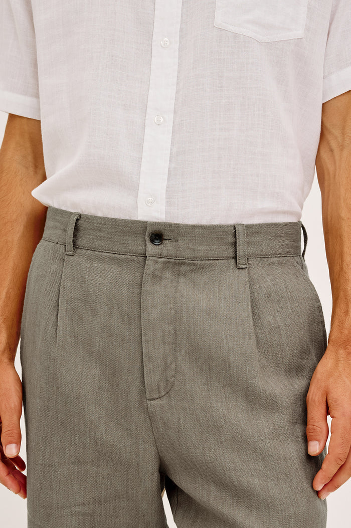 Zimmer Pant in Cotton Linen Wool Blend With Relaxed Fit, Tapered Leg, Side Pockets, Zip Fly, Belt Loops, and Back Welt Pockets in Walnut Colorway - Lower Body Front View Featured on Model