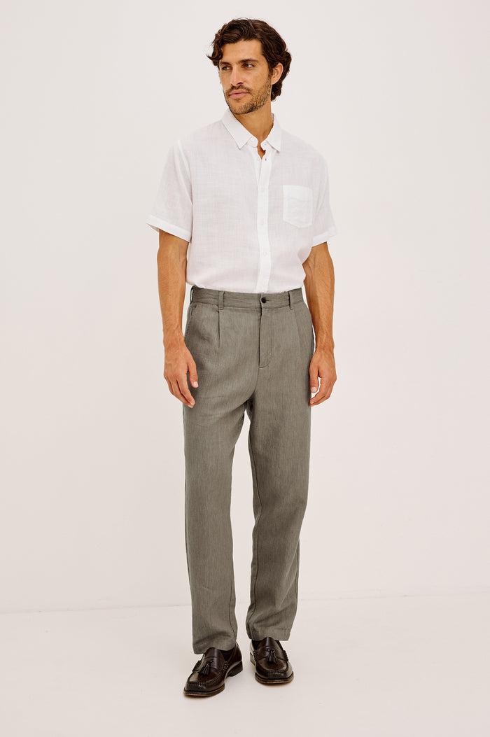 Zimmer Pant in Cotton Linen Wool Blend With Relaxed Fit, Tapered Leg, Side Pockets, Zip Fly, Belt Loops, and Back Welt Pockets in Walnut Colorway - Full Body Front View Featured on Model